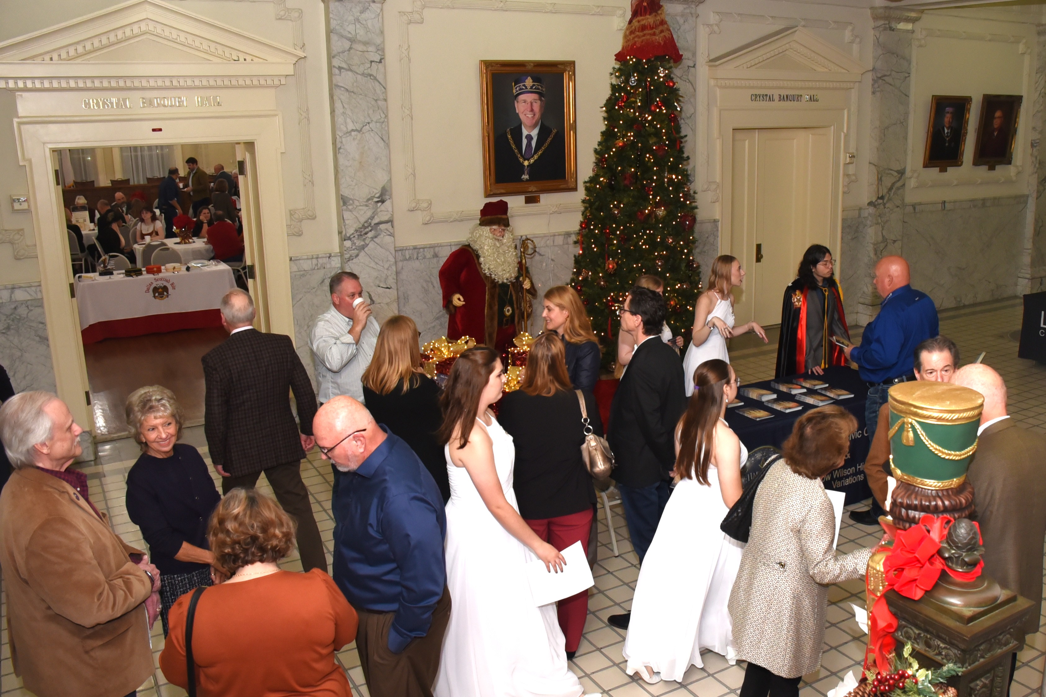 Guests mingling outside the ballroom before the concert